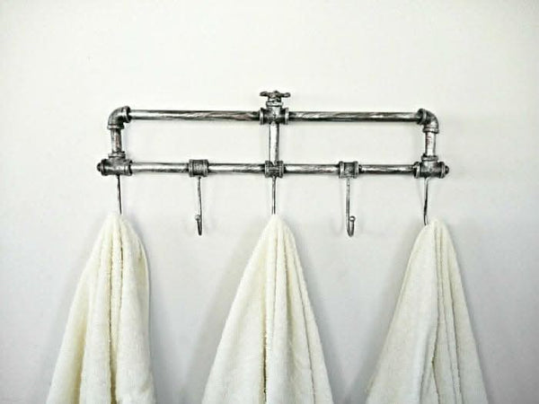 Decorative pipe coat hanger with valve detail