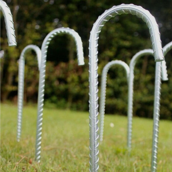Galvanised stakes positioned beside a gazebo