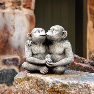 Decorative monkey statue displayed along a pathway