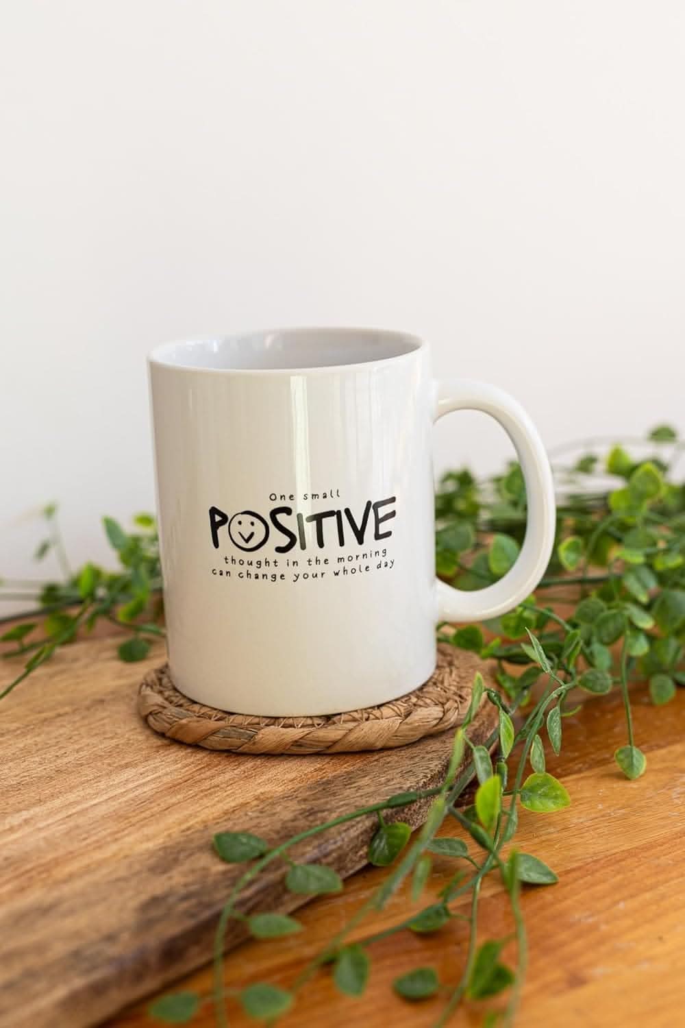 Set of four motivational ceramic coffee mugs