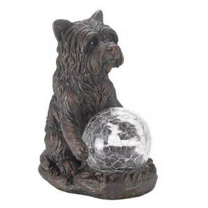Solar powered dog ornament displayed in garden