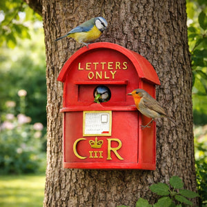 Red garden bird house shown from front