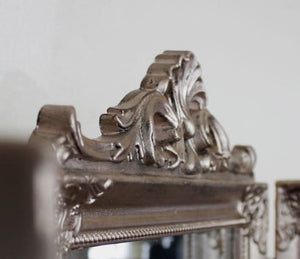 Freestanding three panel vanity mirror in antique silver
