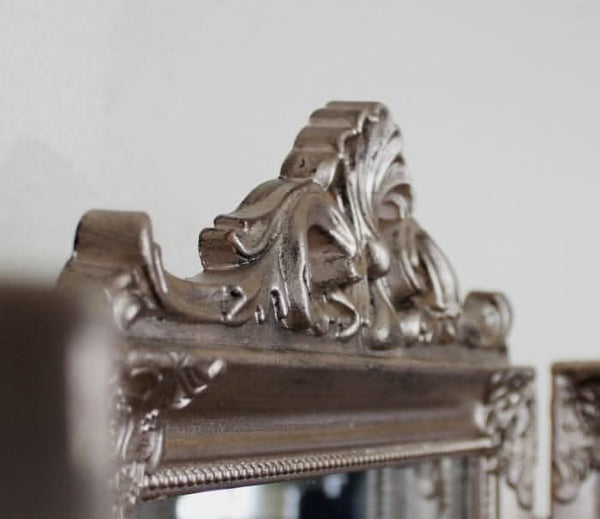 Freestanding three panel vanity mirror in antique silver