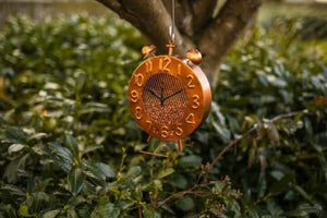 Outdoor bird feeder with copper effect finish