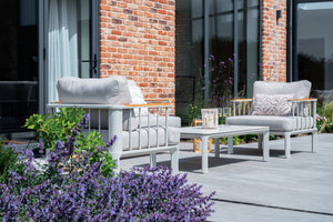 Outdoor sofa set with teak armrests