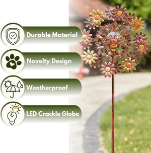 Solar powered floral wind spinner ornament.