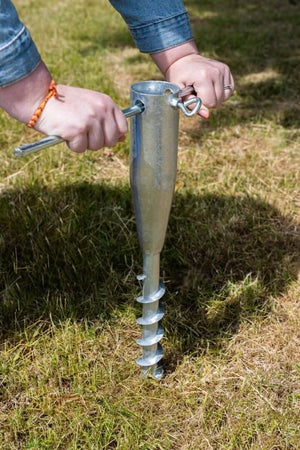 Rotary airer ground spike in outdoor grass