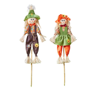 Boy and girl scarecrows for garden