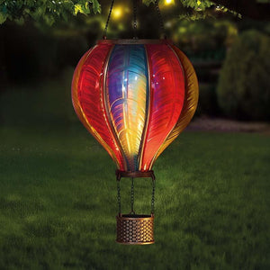 Outdoor solar lantern creating warm flickering illumination
