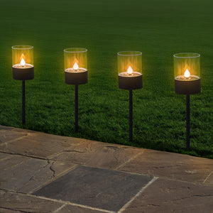 Solar LED lights positioned along garden path