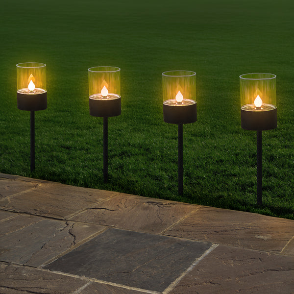 Solar LED lights positioned along garden path