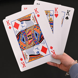 Large laminated playing card deck for outdoor games.