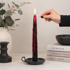 Halloween taper candle set displayed on a mantelpiece
