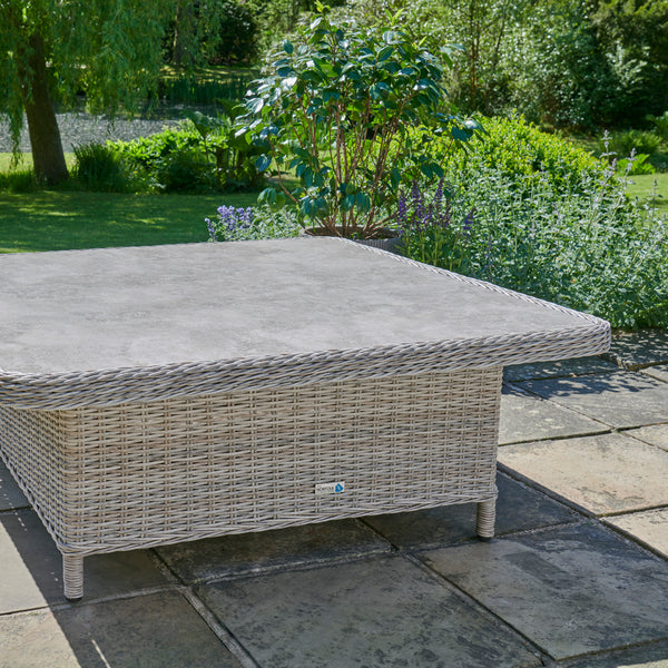 Wicker corner seating with stools