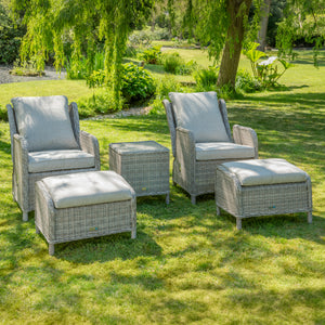 Outdoor lounge chairs with footstools