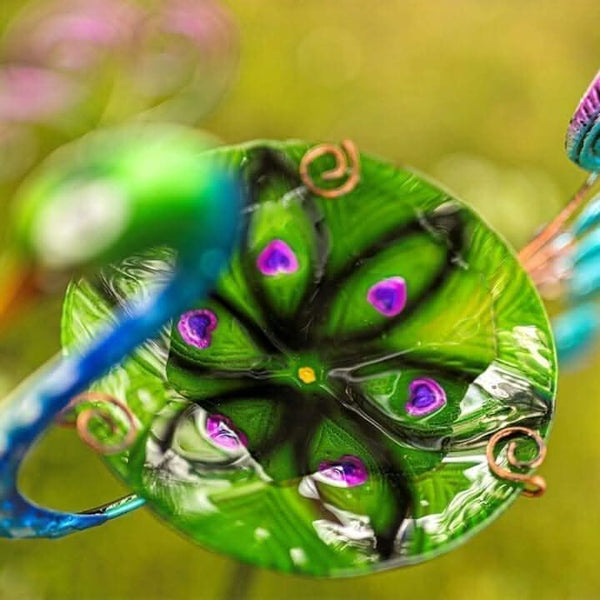 Colourful peacock bird feeder with ground stake
