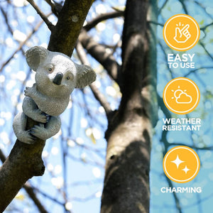 Koala tree hugger creating a playful garden display