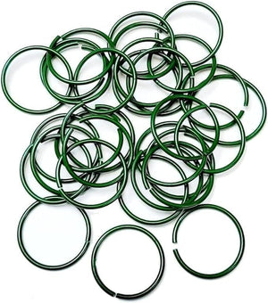 Green plastic coated plant support rings for garden use