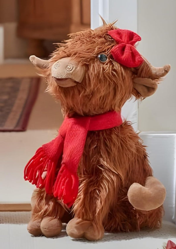 Plush Highland cow Christmas decoration with red scarf