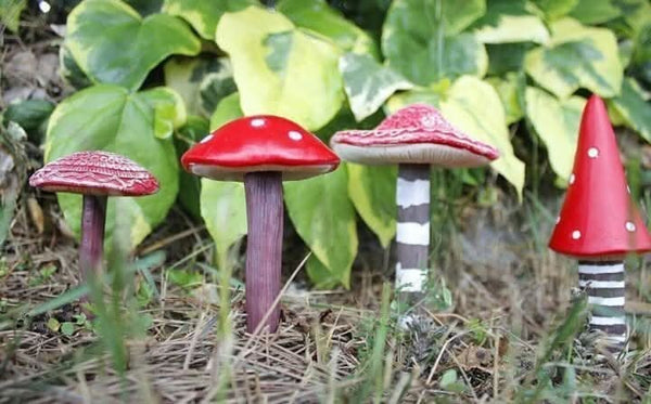 Fairy garden decorated with colourful toadstool figures
