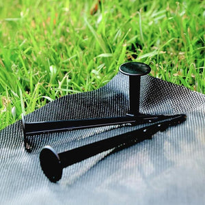 Garden ground sheet secured with included pegs