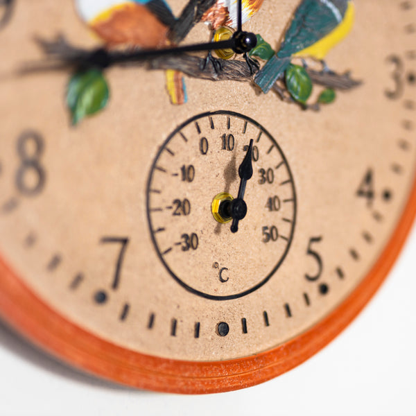 30cm outdoor clock displayed on garden wall