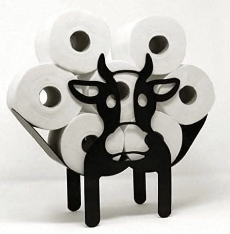 Novelty animal toilet roll stand displayed beside a toilet