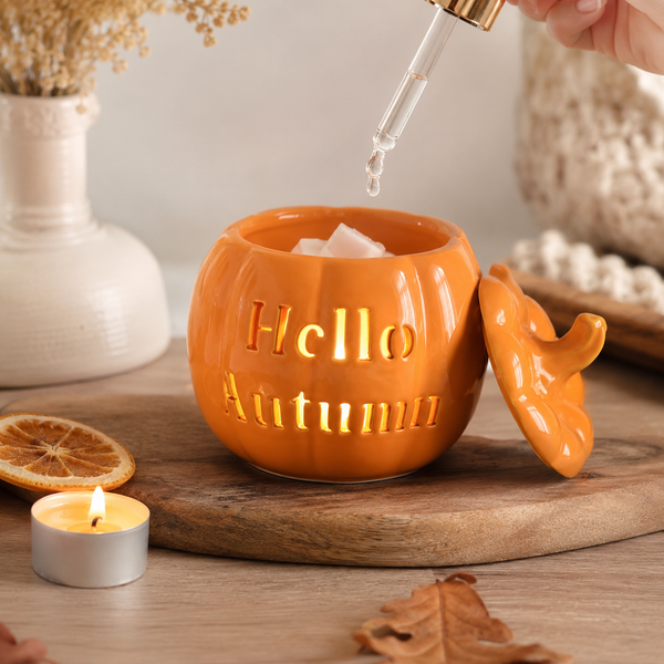 Ceramic wax warmer featuring an autumn pumpkin design