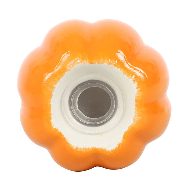 Orange wheel with white center on a white background