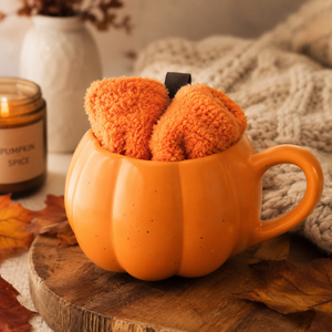 Autumn gift set featuring ceramic mug and fluffy socks