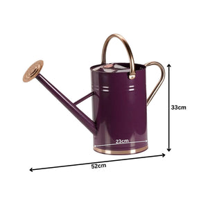 Purple metal watering can designed for garden plants