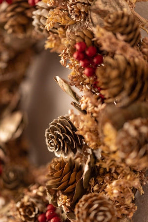 Red berry hanging wreath for festive home decor