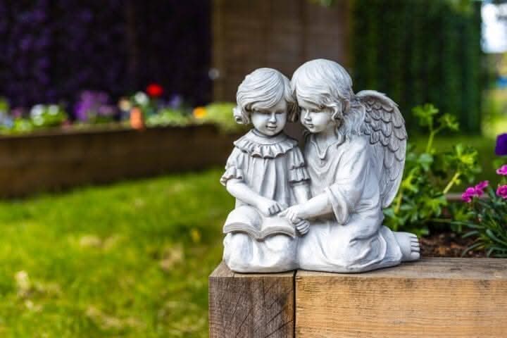 Resin reading angel lamp statue