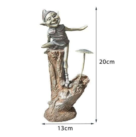 Bronze effect fairy statue displayed on patio