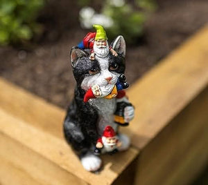 Humorous garden ornament for flower beds and balconies