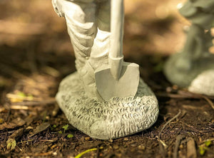 Grey stone effect boy and girl statues