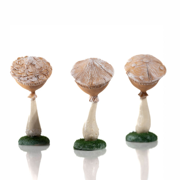 Three novelty mushroom ornaments shown from front