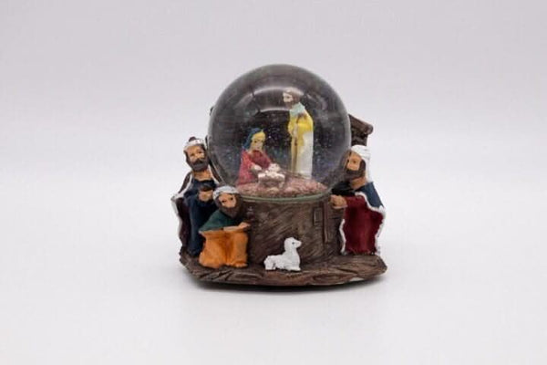 Glass and resin nativity snow globe decoration