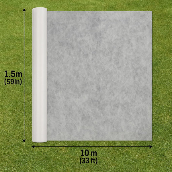 Breathable garden fleece covering raised vegetable beds.