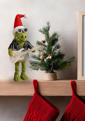 Plush T Rex wearing Santa hat and sunglasses