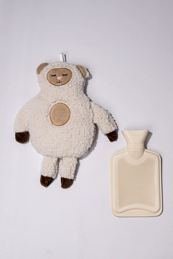 Rubber hot water bottle with sheep fabric cover