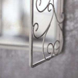Vintage shutter wall decoration with mirrored centre