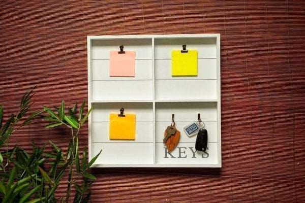 Rustic hallway key holder with decorative white finish