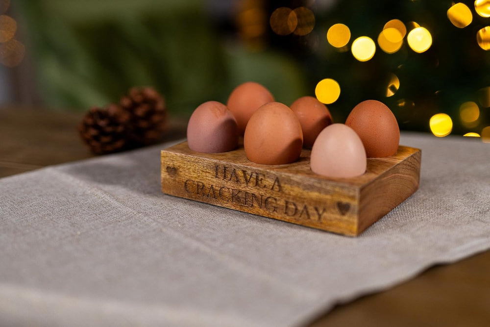Wooden egg holder with Have a Cracking Day design.