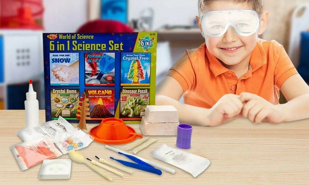 Child with a science experiment set on a table, wearing goggles.