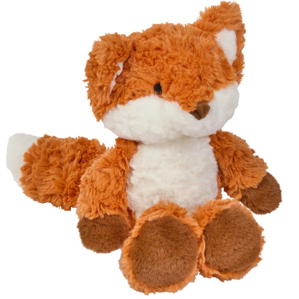 A plush stuffed fox toy with fluffy orange-brown fur, a white chest and face, and dark brown paws and nose, photographed on a plain white background.