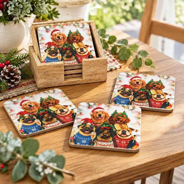 Four square coasters with a festive holiday print of four dogs in Christmas sweaters, displayed on a wooden table with a wooden holder and holiday decorations.