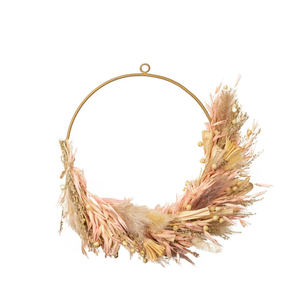 Decorative wreath with dried flowers on a white background