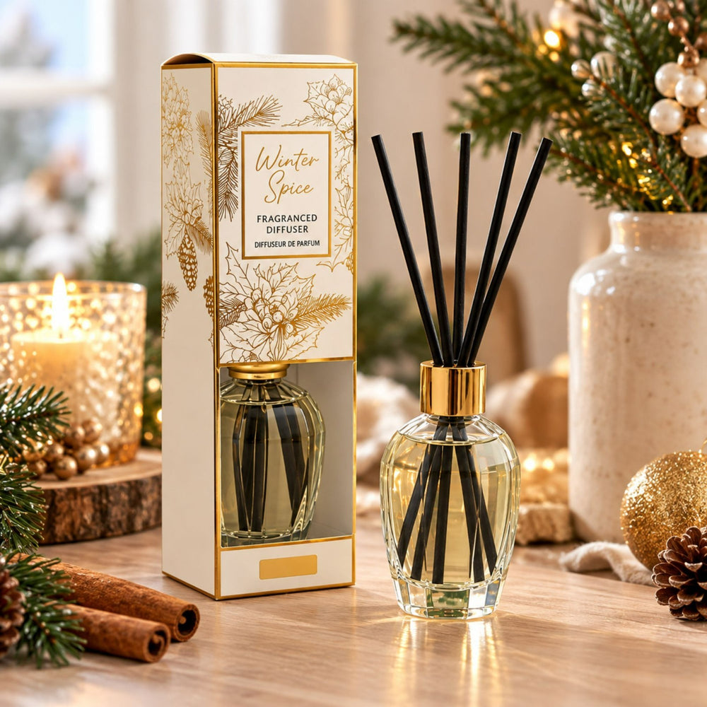 300ml Cinnamon Spice reed diffuser with gold detailing and festive gift packaging.